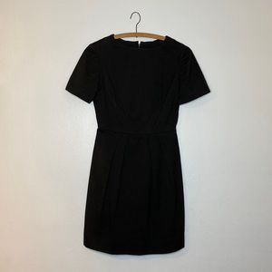 Handmade dress no tags. Unlined with darts to make this dress fit like a glove.